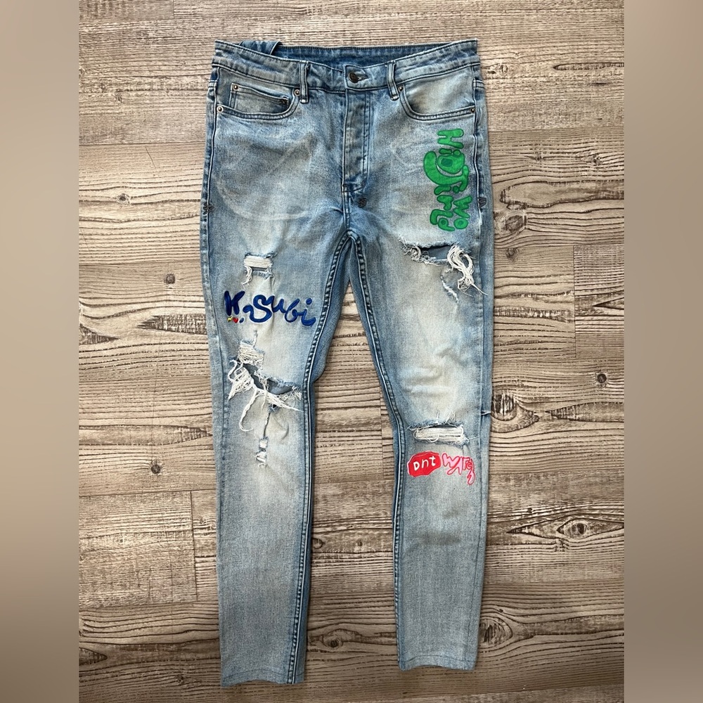 KSUBI x HIDIJI WORLD CHITCH ‘OUTSIDE WORLD’ JEANS